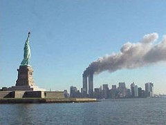 250px-National_Park_Service_9-11_Statue_of_Liberty_and_WTC_fire.jpg